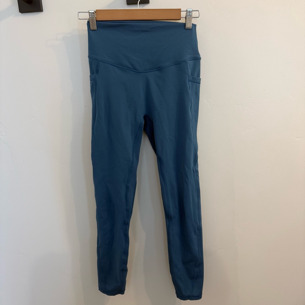 Acta Women's High-Waisted Blue Leggings with pockets